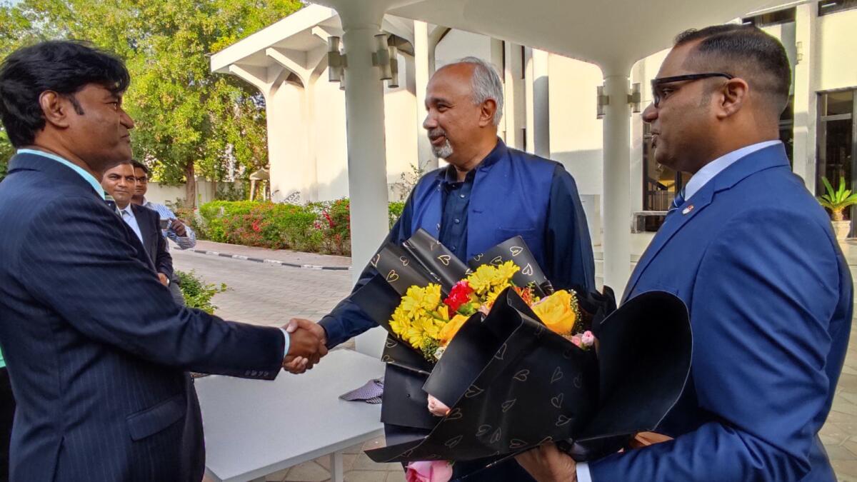 Pakistan ambassador greets a pastor.