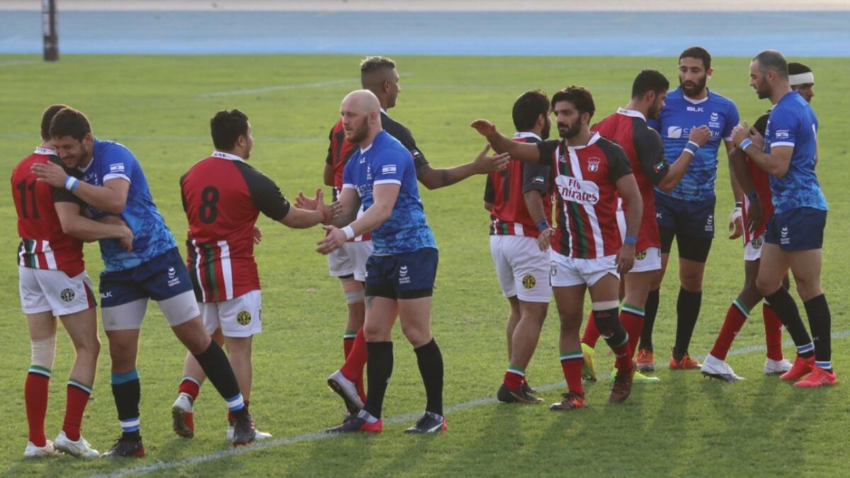 The UAE and Israel players shake hands after their match in Dubai on Friday. (Photo by Shihab)