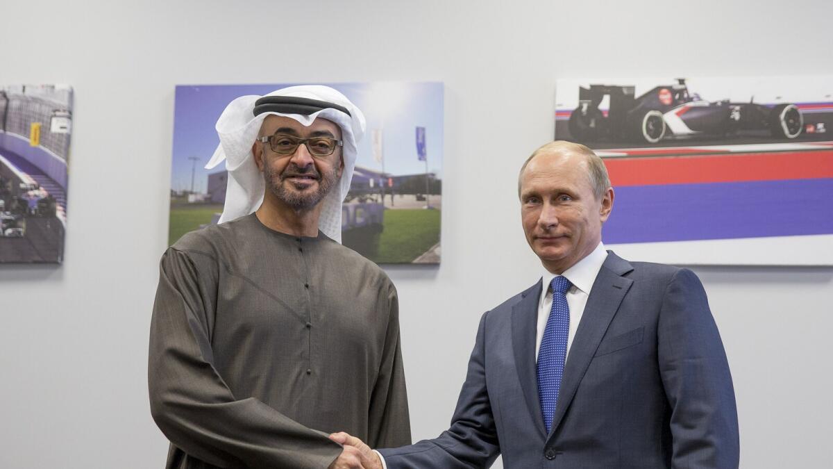 Shaikh Mohammed bin Zayed being greeted by Vladimir Putin Vladimirovich, prior to the meeting on the sidelines of the Formula 1 Russian Grand Prix on Sunday. — Wam