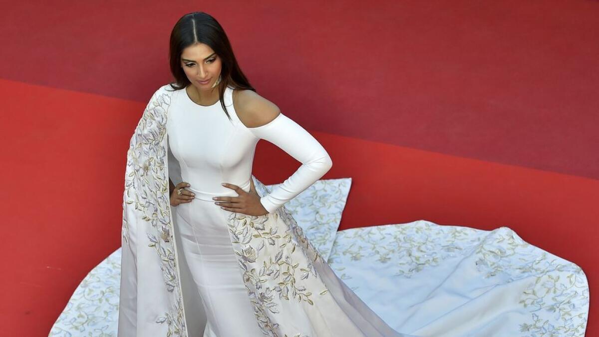 Indian actress Sonam Kapoor poses as she arrives for the screening of the film 'Mal de Pierres (From the Land of the Moon)' at the 69th Cannes Film Festival in Cannes, southern France.   