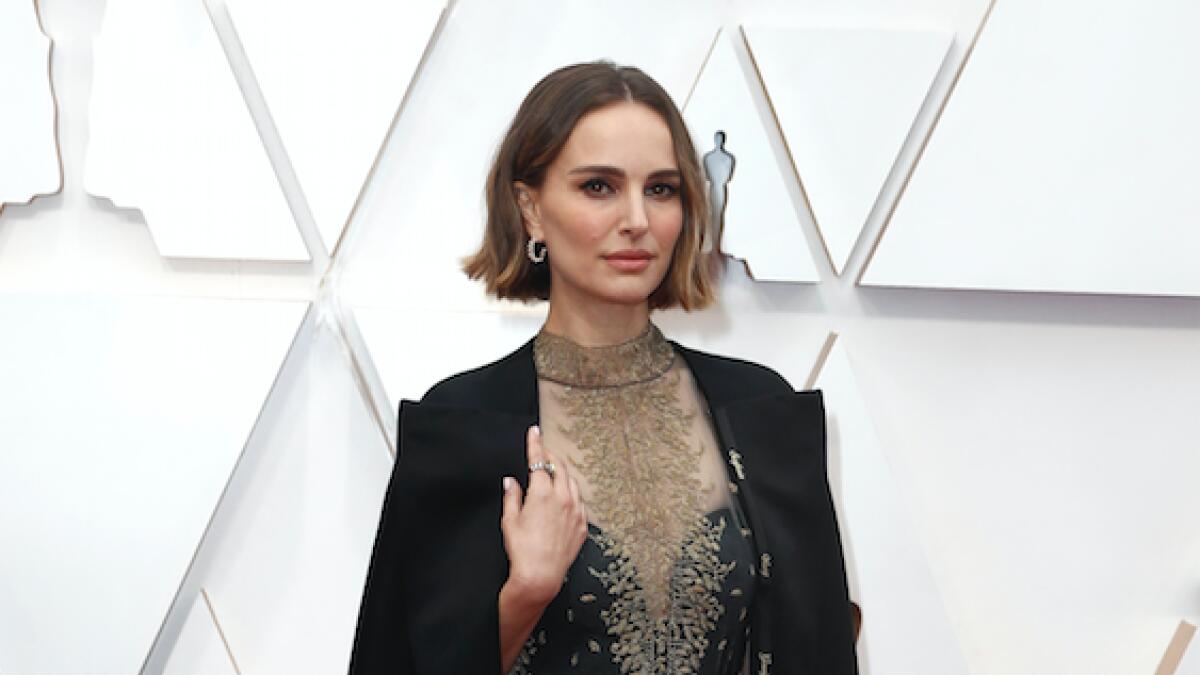 Natalie Portman used her Maria Grazia Chiuri’s embroidered cape to showcase the names of female directors snubbed by the Academy stitched into the fabric.