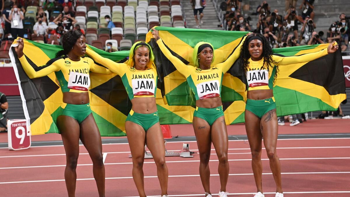 Jamaica's Shericka Jackson, Briana Williams, Shelly-Ann Fraser-Pryce and Elaine Thompson-Herah celebrate after winning the women's 4x100m relay final. (AFP)