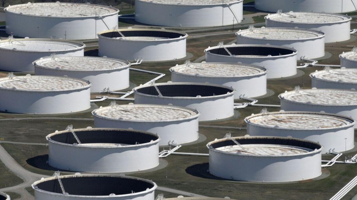 Crude oil storage tanks are seen from above at the Cushing oil hub in Oklahoma. — Reuters file