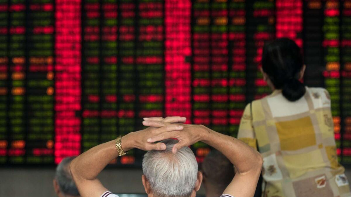 China stocks slump 6% on fears of further yuan fall