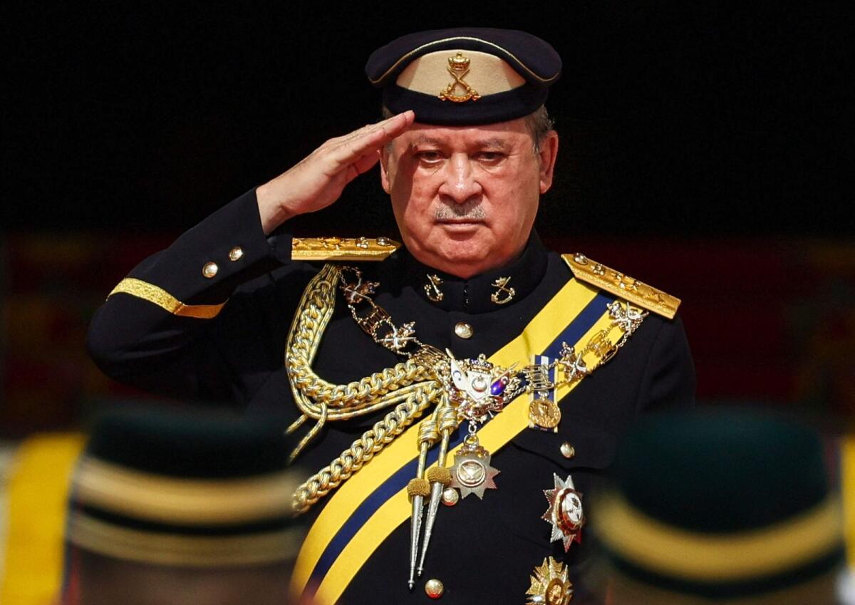 King of Malaysia Sultan Ibrahim Iskandar salutes the guard of honour during a welcoming ceremony at the National Palace in Kuala Lumpur on January 31, 2024. — AFP