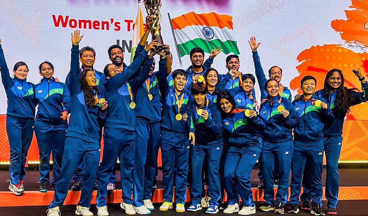 The Indian women's team celebrate their victory. — PTI