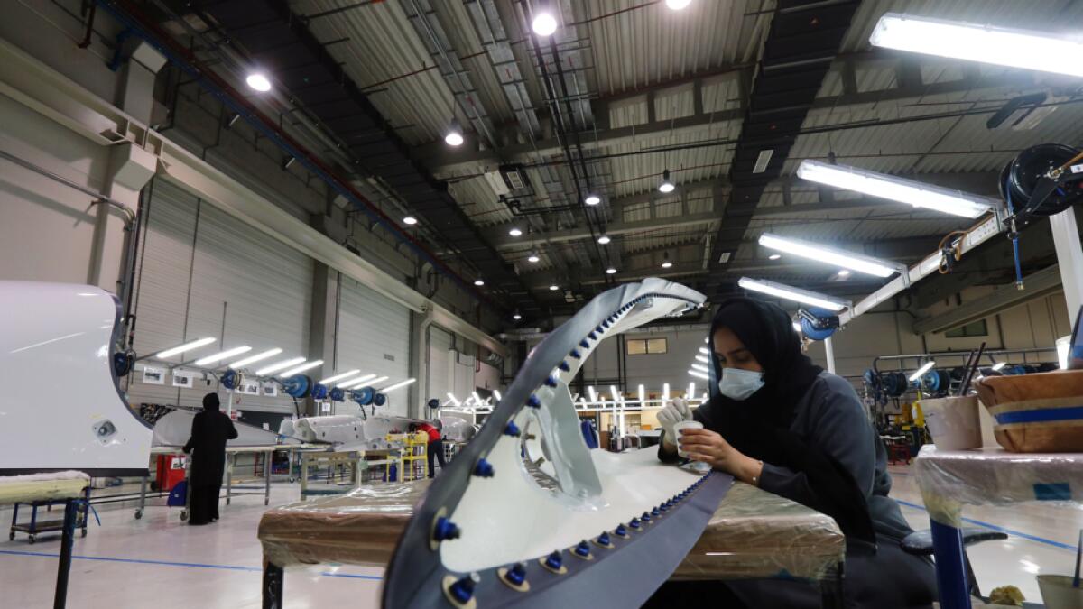 A worker details a plane part made at the Strata manufacturing facility, an Emirati factory producing parts for Airbus and Boeing jets, as they make personal protective equipment such as N95 masks, in Al Ain. Photo: Reuters