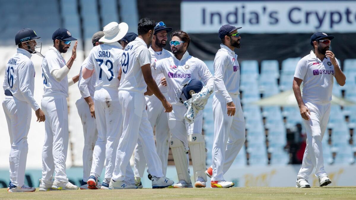 Indian players celebrate after winning the first Test on Thursday. (AP)