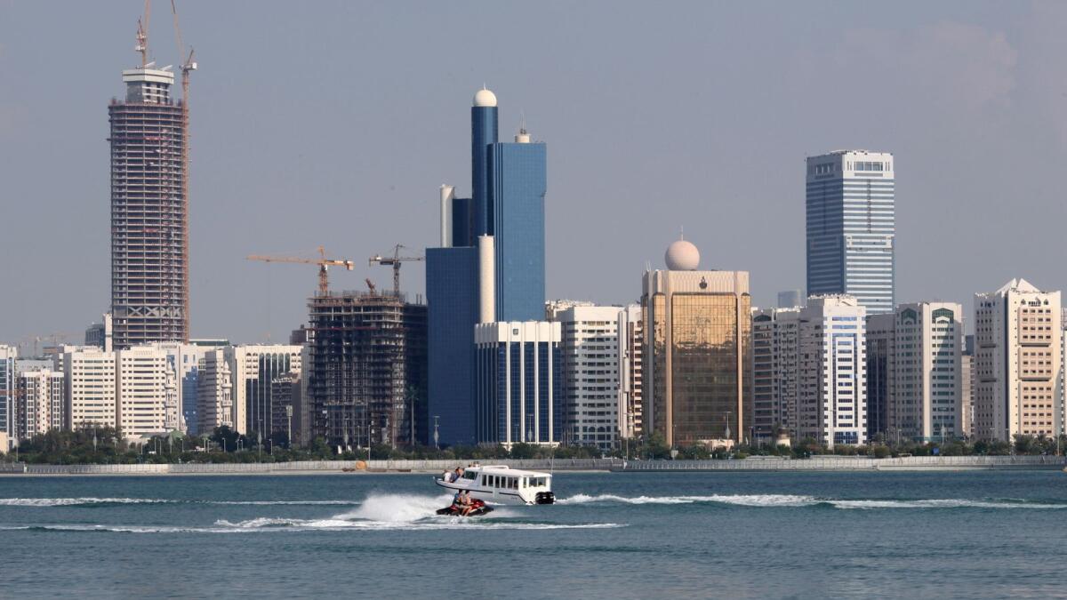 A general view of the Abu Dhabi skyline. Economists at ICAEW expect a 12.8 per cent rise in the oil GDP this year with oil output averaging 3.1million barrels per day. — Reuters file photo