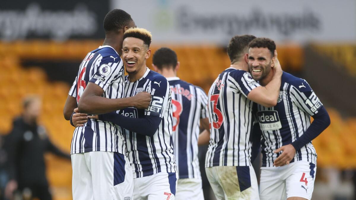 West Bromwich Albion's Callum Robinson celebrates with teammates after the match. — Reuters