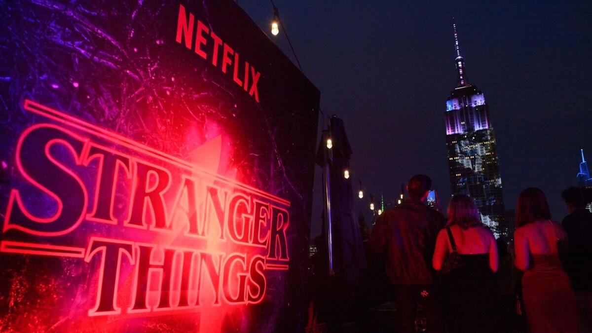 Signage and projections on the Empire State Building are seen at the Stranger Things Event. Photo: AFP