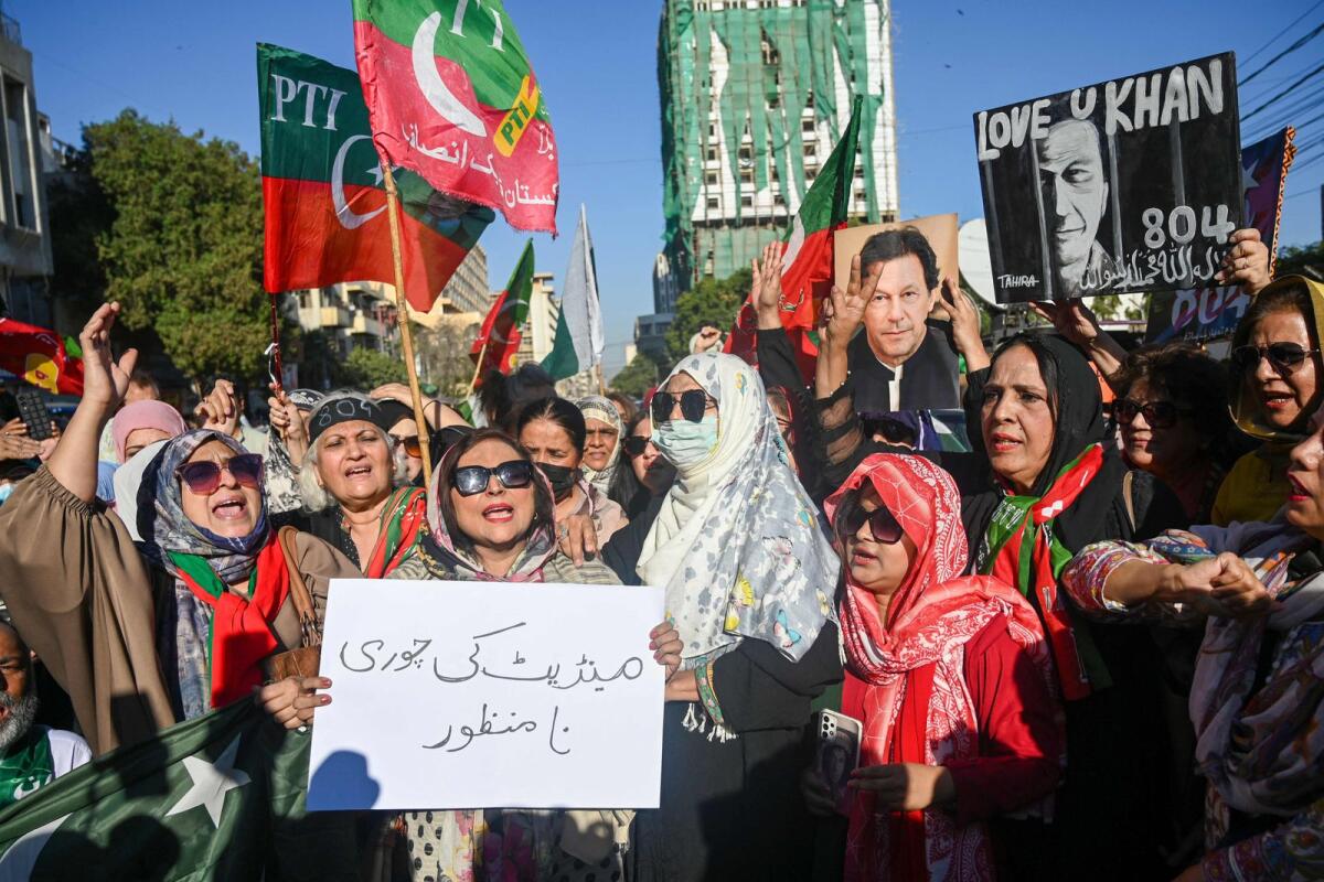 Supporters of former prime minister Imran Khan's Pakistan Tehreek-e-Insaf (PTI) party protest in Karachi  on February 17, 2024. Photo: AFP