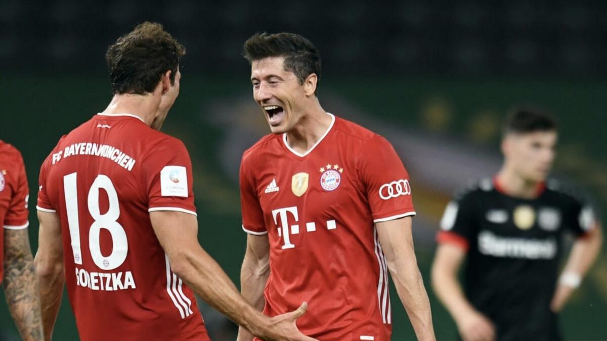 Bayern Munich's Robert Lewandowski celebrates scoring their fourth goal. - Reuters
