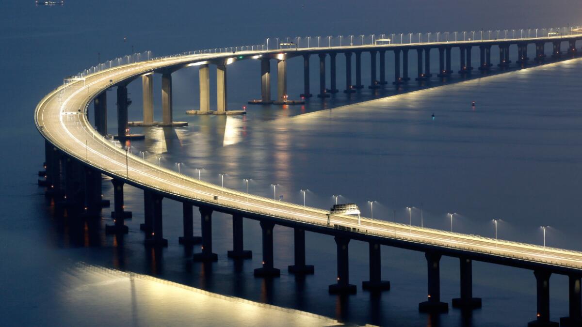 Video: Worlds longest sea-crossing bridge opens in China