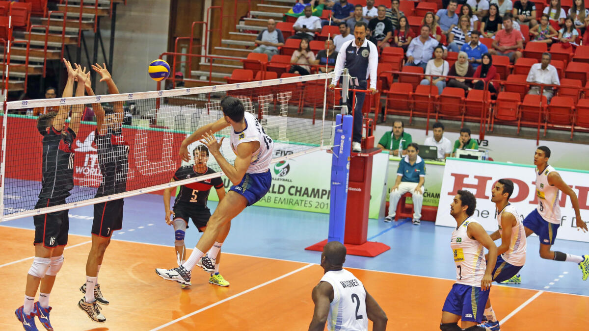 A Brazil player goes for a smash against Turkey at the U-23 World Championship 2015 in Dubai on Saturday. Brazil won 3-1.