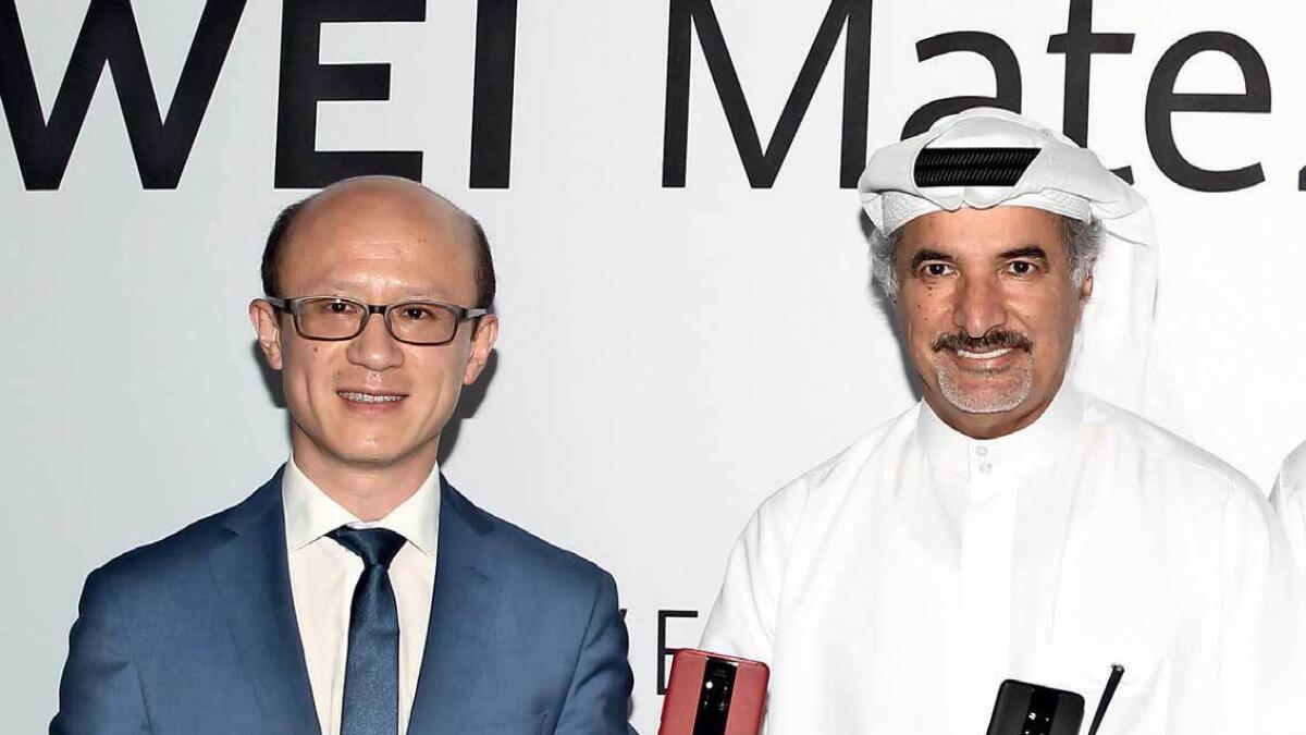 Gene Jiao, Saeed Hareb and Issam Kazim at the launch of Huawei Mate20 Series in Dubai on Wednesday. — Photo by Juidin Bernarrd