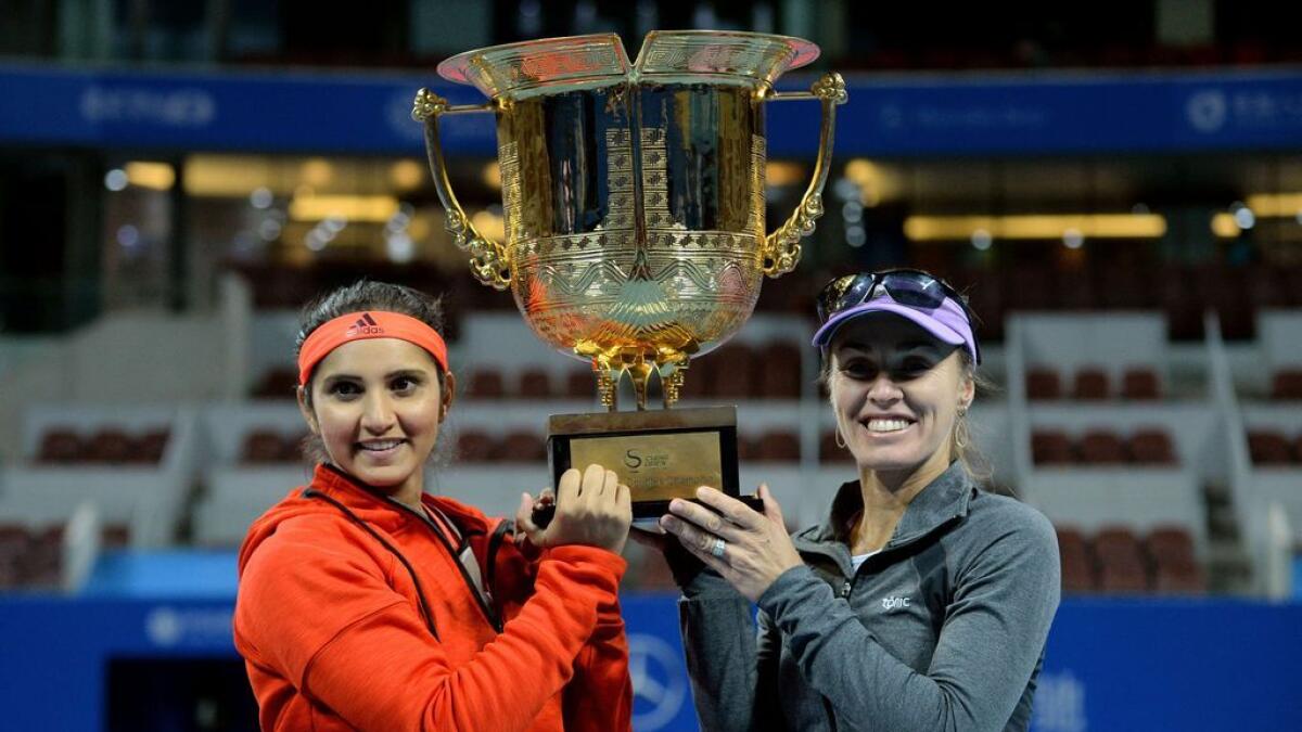 Sania Mirza, Martina Hingis claim China Open