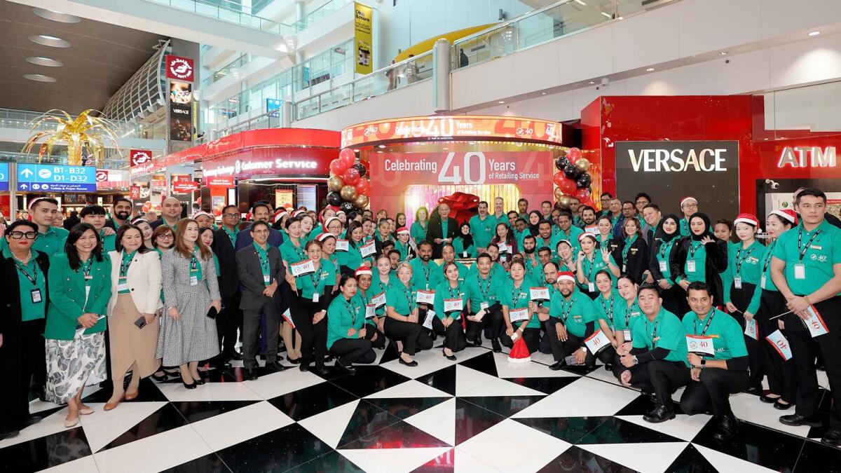 The Dubai Duty Free management and staff at the Dubai Duty Free 40th Anniversary celebration in Concourse C.