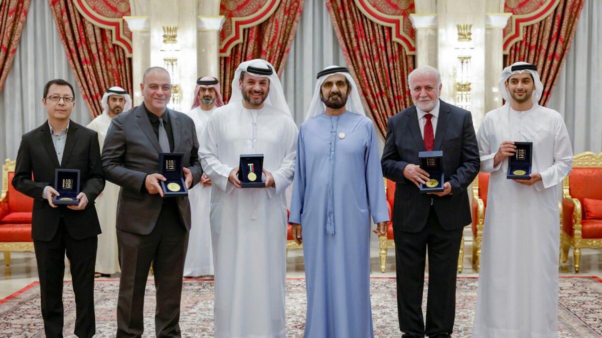 Sheikh Mohammed with the winners of the Mohammed Bin Rashid Medal for Scientific Distinction in Dubai. — Wam