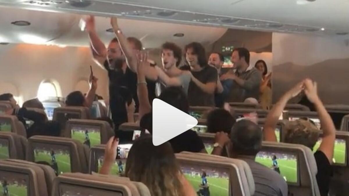 Video: Ecstatic fans celebrate Frances victory on Emirates flight