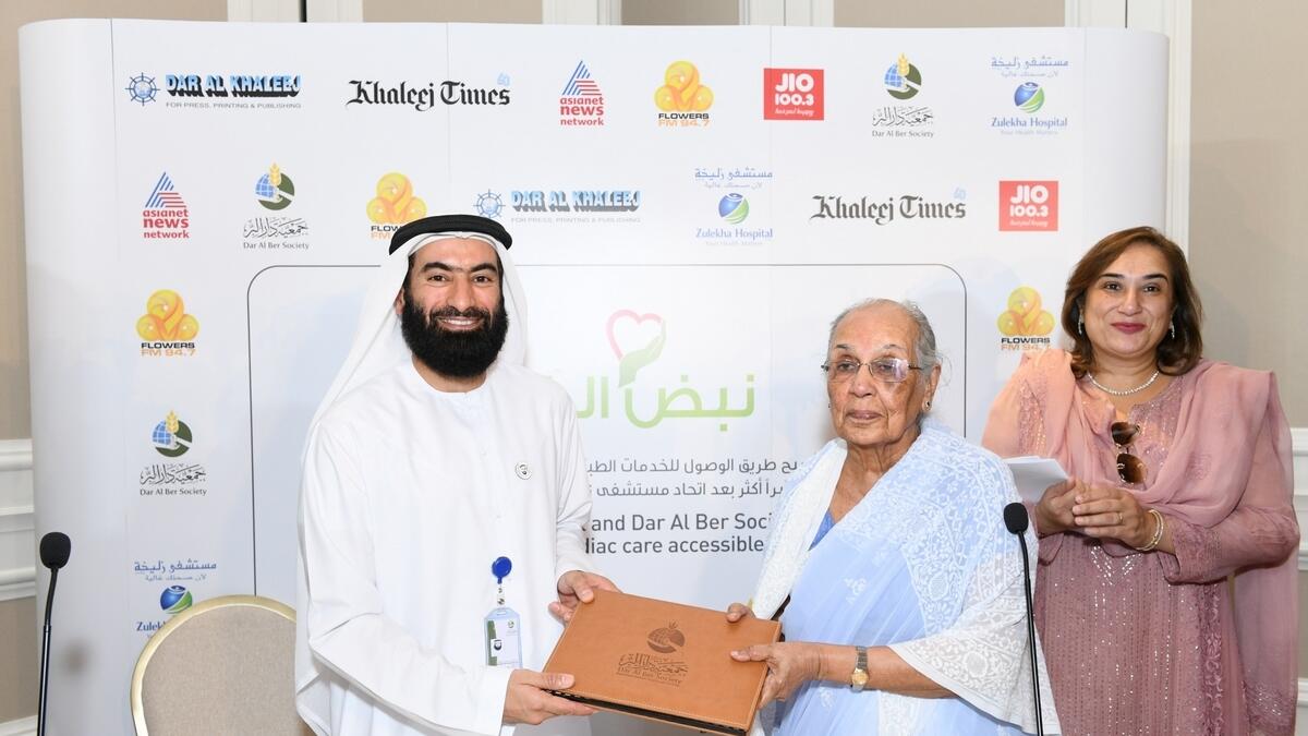 Abdullah Al Falasi and Dr Zulekha Daud signing off the Nabd Al Khair partnership agreement.-Supplied photo 