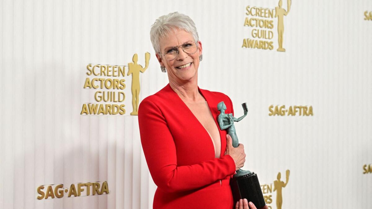 Jamie Lee Curtis poses with the award for outstanding Female Actor in a Supporting Role - Motion Picture for 'Everything Everywhere All at Once'
