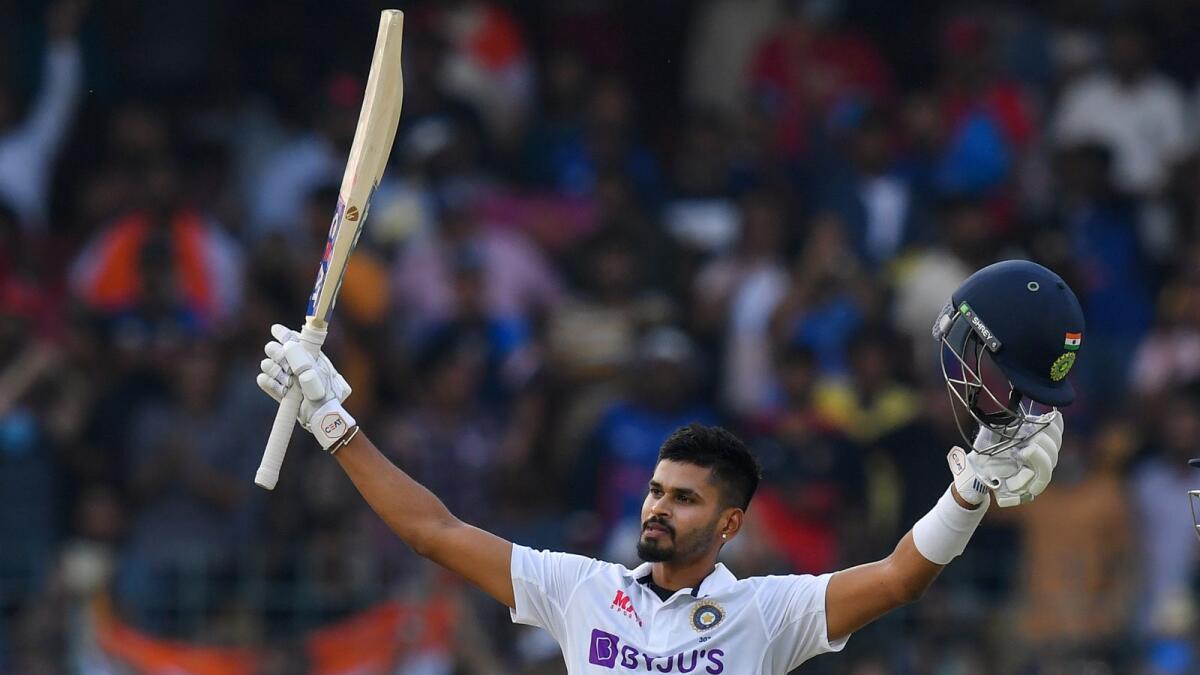 India's Shreyas Iyer celebrates after scoring a half-century (50 runs) during the first day of the second Test cricket match between India and Sri Lanka at the M. Chinnaswamy Stadium in Bangalore on March 12, 2022. Photo: AFP