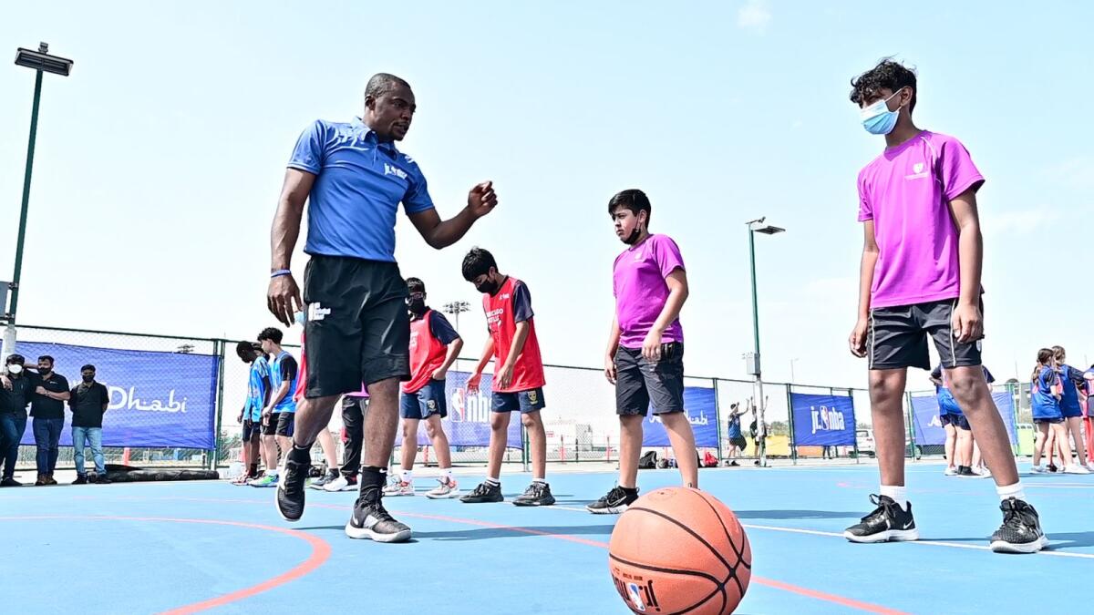 An NBA coach training school children during a training session in Abu Dhabi. (Photo by Neeraj Murali)