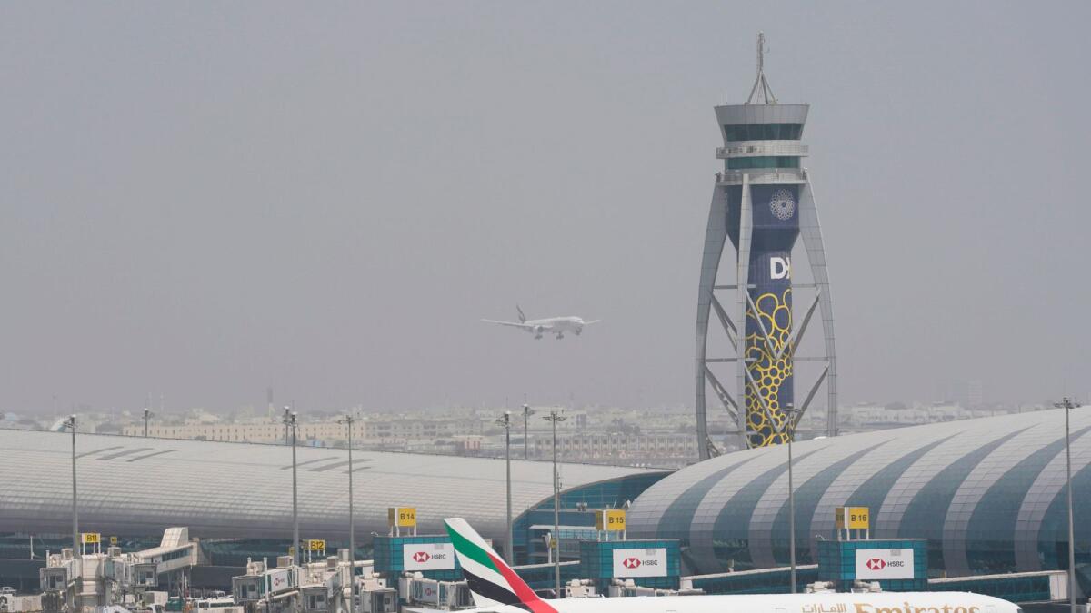 Emirates aircraft at Dubai International Airport. The Group closed the first half year of 2022-23 with a strong cash position of Dh32.6 billion on September 30, compared to Dh25.8 billion, as on March 31. - AP file