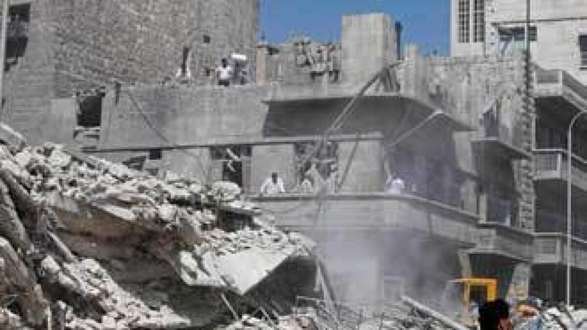 Syrian air strike on fuel station kills 54