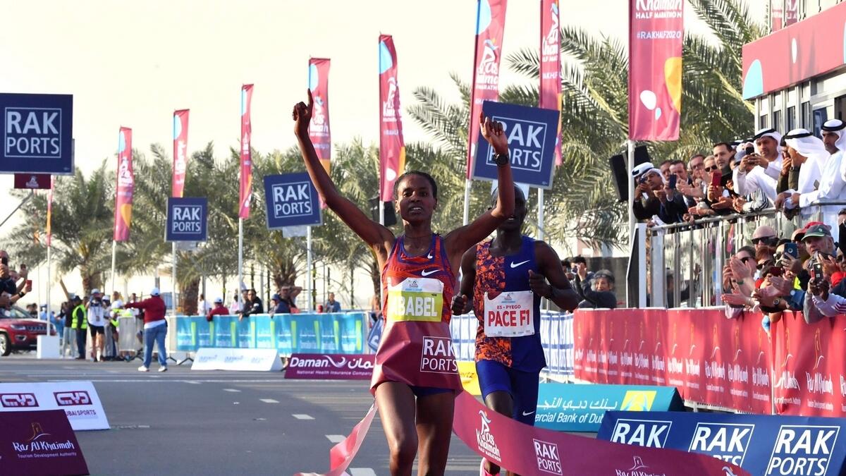 THE WINNER: Ababel Yeshaneh crosses the finish line of RAK Half Marathon.