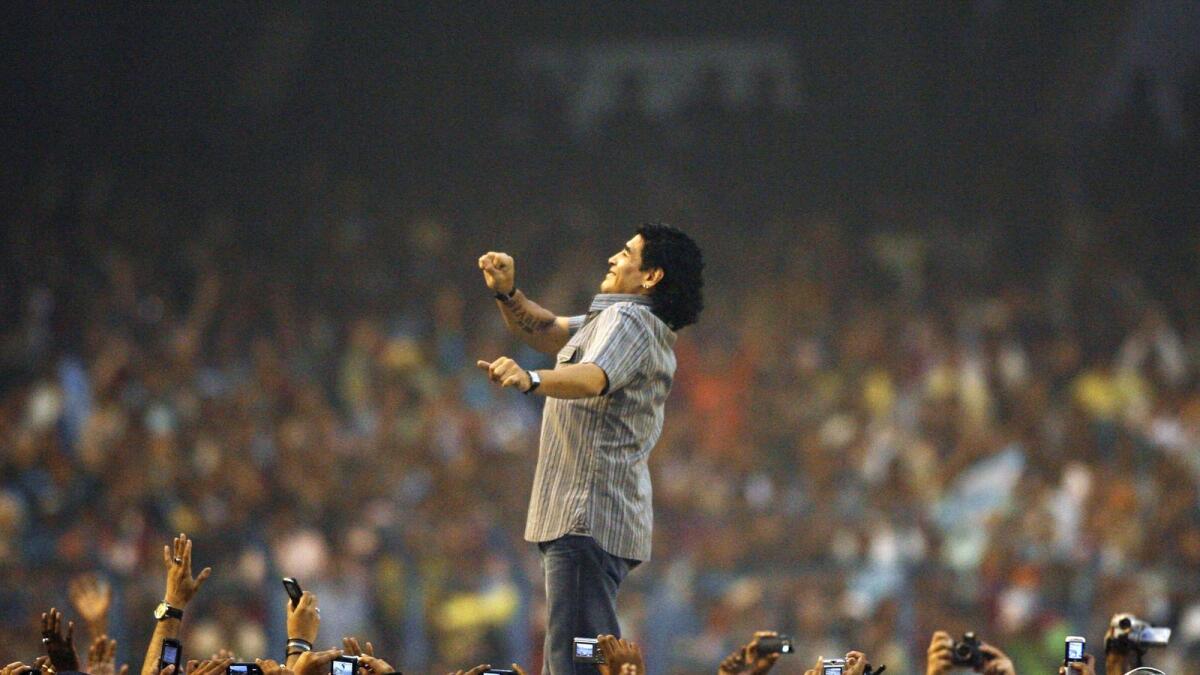 Diego Maradona gestures as he attends a felicitation programme at Salt Lake Stadium in Kolkata, India, in 2008. (AFP)