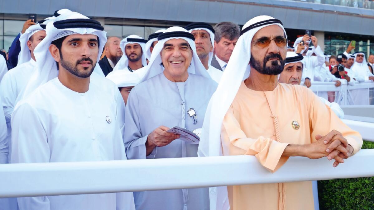 His Highness Sheikh Mohammed bin Rashid Al Maktoum, Vice-President and Prime Minister of the UAE and Ruler of Dubai,with Sheikh Hamdan bin Mohammed bin Rashid Al Maktoum, Crown Prince of Dubai and Chairman of Dubai ExecutiveCouncil watching the victory of Cross Counter in the third race at Dubai World Cup at Meydan in 2019. —Photo by Shihab