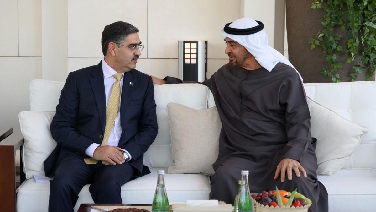 Sheikh Mohamed bin Zayed receives Anwaar-ul-Haq Kakar in Abu Dhabi on Monday. - Wam