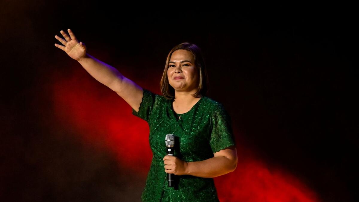 Vice-presidential candidate Sara Duterte-Carpio, daughter of Philippine President Rodrigo Duterte, waves to her supporters during the first day of campaign period for the 2022 presidential election, at the Philippine Arena, in Bocaue, Bulacan province, Philippines, February 8, 2022. REUTERS/Lisa Marie David
