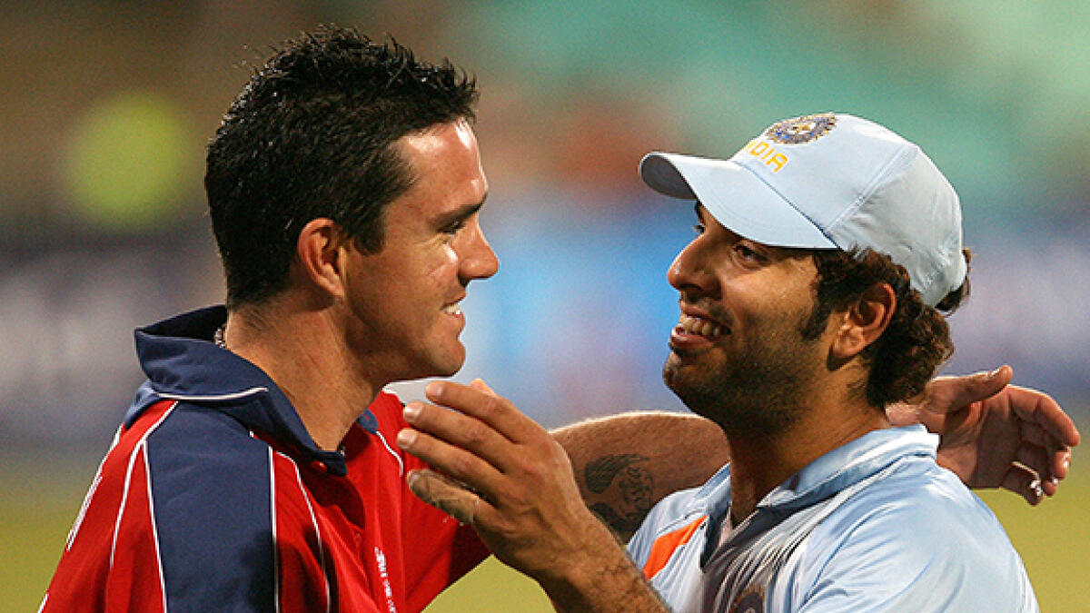 Former cricket stars, India's Yuvraj Singh and England's Kevin Pietersen (left), have expressed different views on the resumption of the English Premier League sans fans. -- AFP