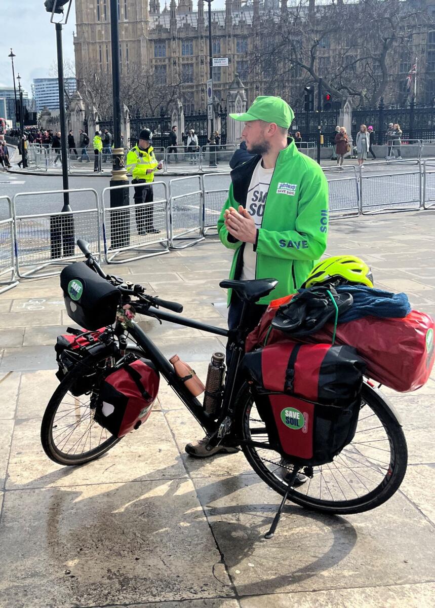 Rens Goede, gardener from Amsterdam, begins his 30,000km bicycle trek from London to India in support of the 'Save Soil' movement in London, Britain, on Wednesday. — Reuters