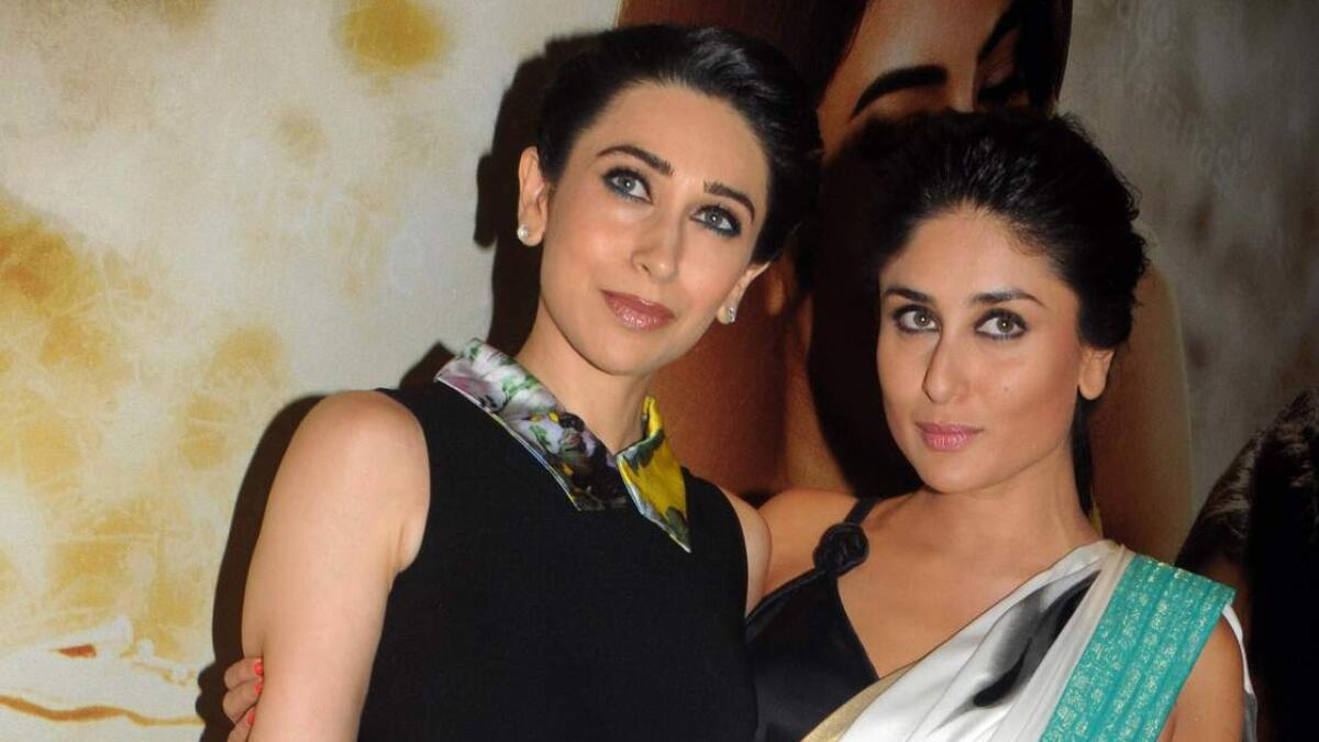 Indian Bollywood film actresses and sisters Karishma Kapoor (L) and Kareena Kapoor.