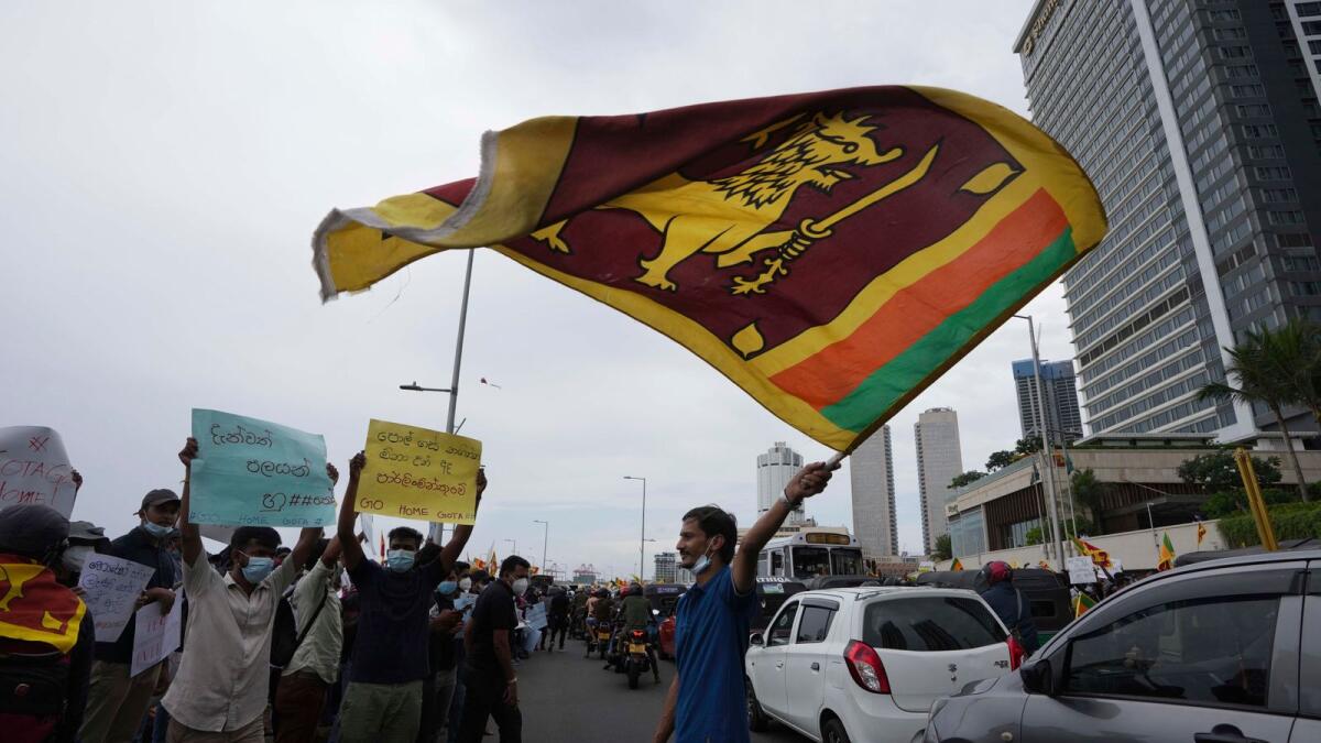 Seven people died and more than 200 were injured on Monday as thousands defied a curfew to protest against the Lankan government. (AFP)