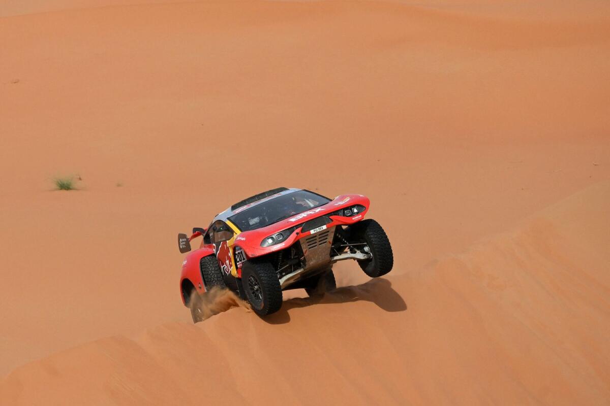 French driver Sebastien Loeb and Belgian co-driver Fabian Lurquin in action. — AFP