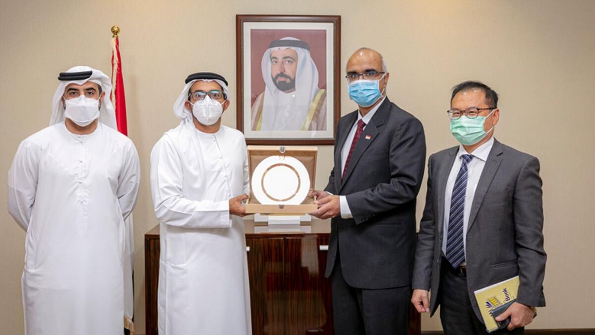 Sheikh Fahim Al Qasimi presenting Kamal R. Vaswani, Ambassador of Singapore to the UAE with DGR memorial shield. — Supplied photo