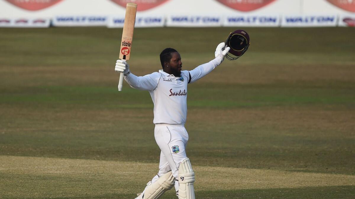 West Indies' Kyle Mayers celebrates after scoring a double century during the fifth day of the first cricket Test against Bangladesh. — AFP