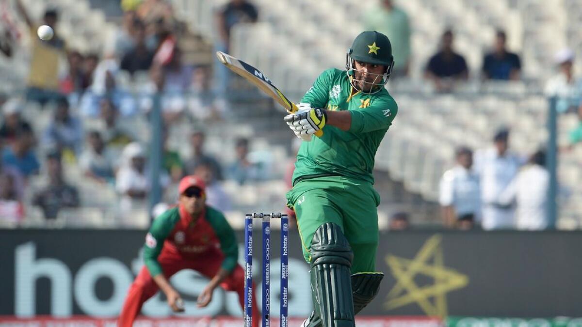 Pakistan's Sharjeel Khan plays a shot during the World T20 tournament cricket match between Bangladesh and Pakistan at The Eden Gardens Cricket Stadium in Kolkata on March 16, 2016