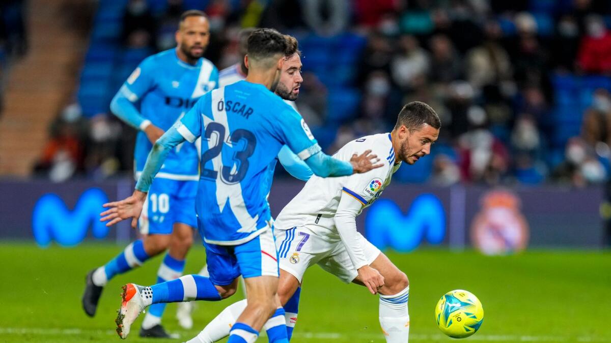 Real Madrid's Eden Hazard (right) missed Sunday’s 4-1 league win at Granada. — AP