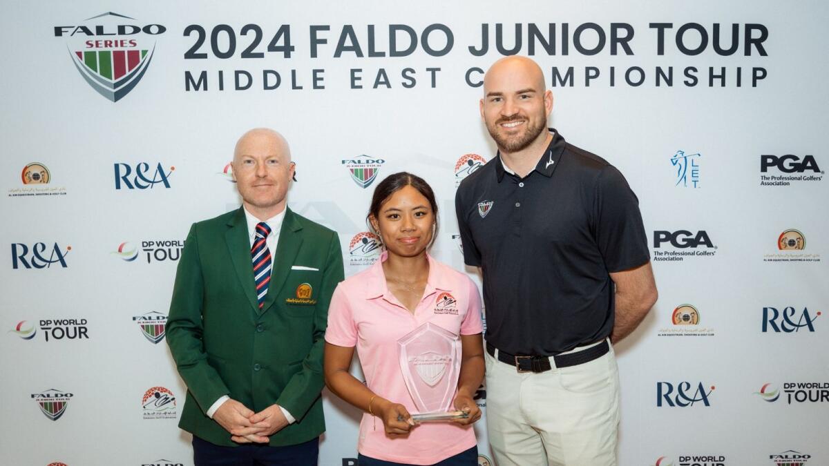 The UAE's Jamie Camero (centre), winner of the Faldo Series at Al Ain Equestrian, Shooting and Golf Club with officials.- Sipplied photo