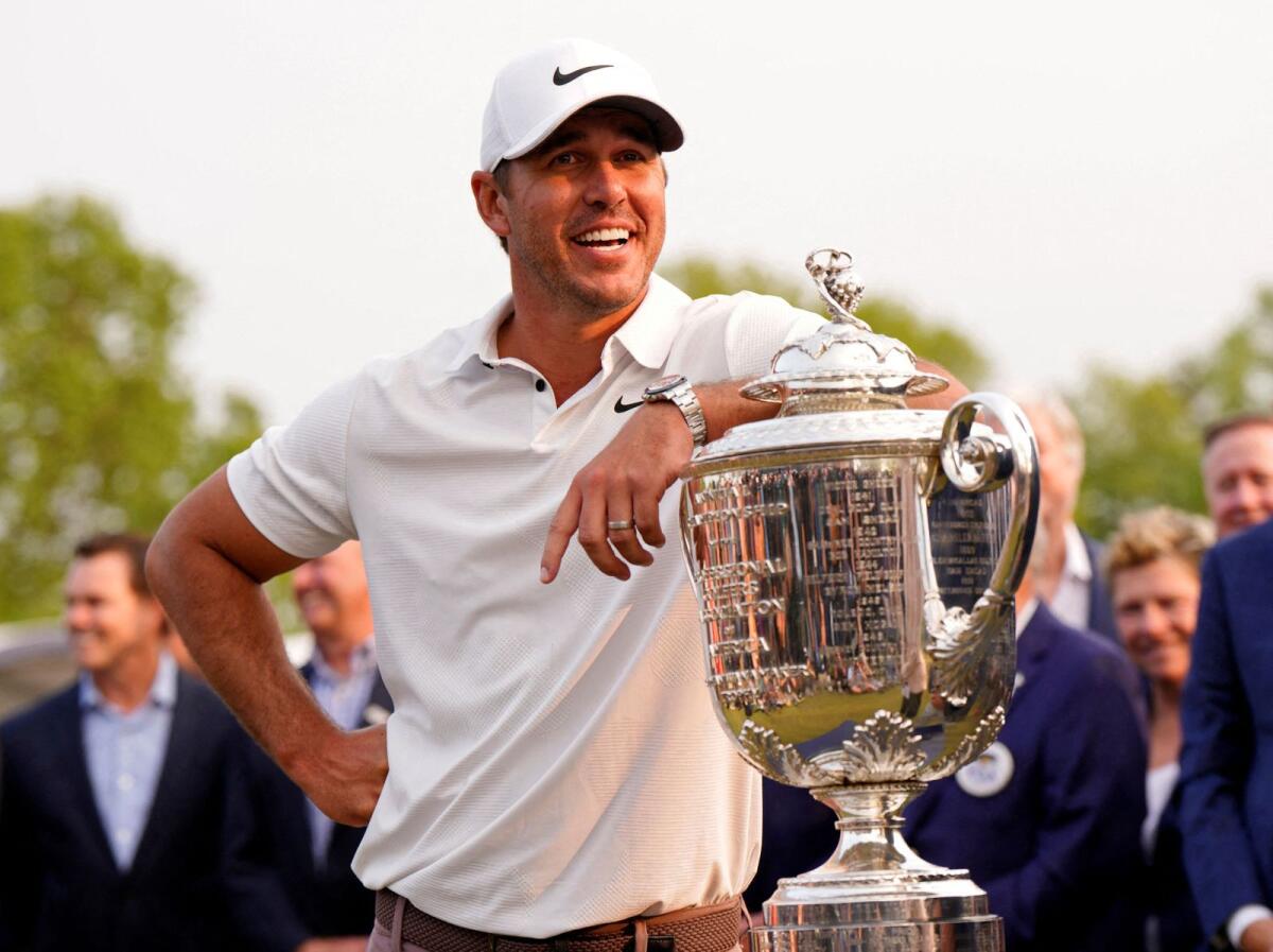 Brooks Koepka celebrates after winning the PGA Championship. — Reuters