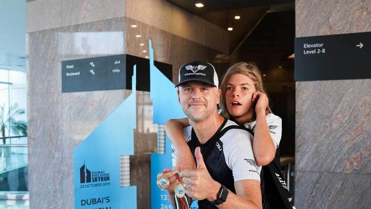 Dubai based, triathlete father, son, Guinness World Records, toughest races
