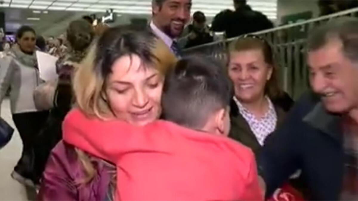 Watch: Iranian mom, 5 year old son reunited after US visa ban