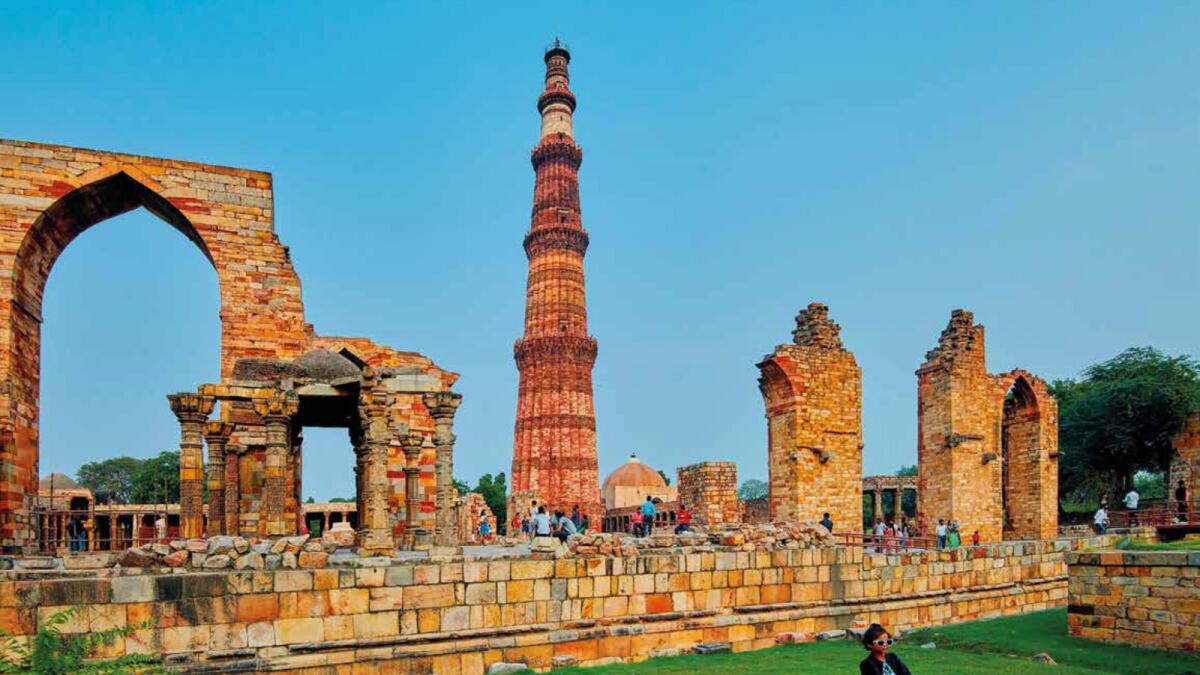The 13th-century, 238-foot-high Qutab Minar in New Delhi. Beneath an ancient tower, contemporary galleries, studios, bars and clubs are popping up in three Delhi neighbourhoods, drawing art lovers, fashionistas and nightlife seekers. (Poras Chaudhary/The New York Times)