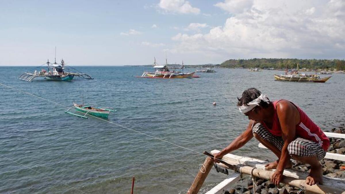 Philippines free to fish in shoal but Chinese ships remain